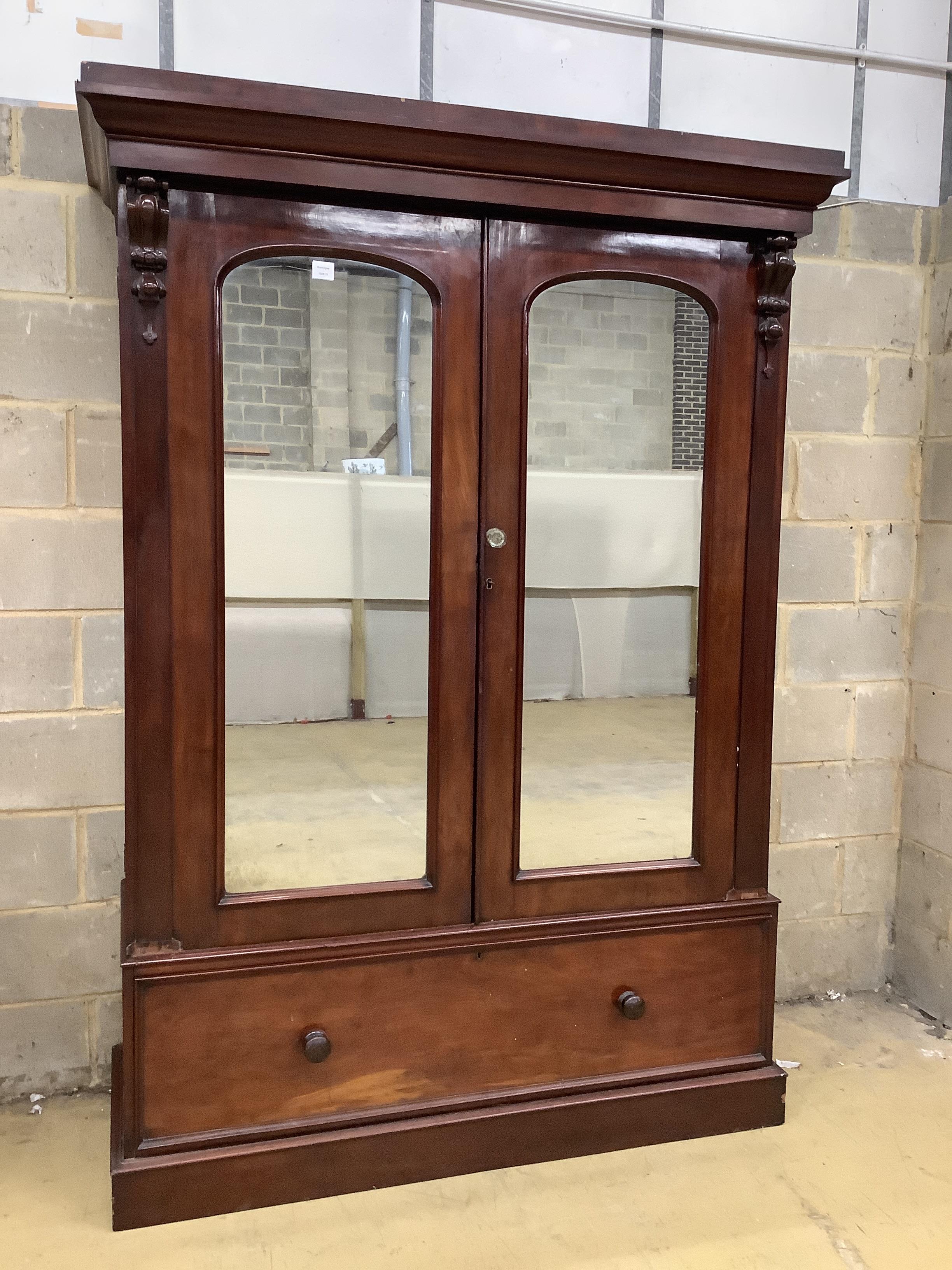 A Victorian mahogany mirrored compactum wardrobe, width 150cm, depth 60cm, height 211cm